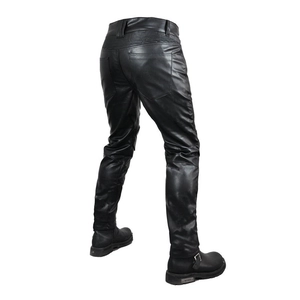 Detail of motorcycle leather pants featuring elastic accordion panels for riding comfort