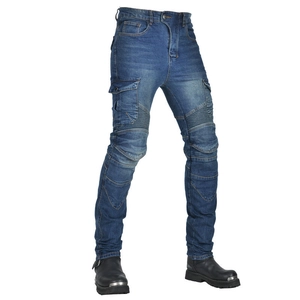 Detail of blue motorcycle jeans with knee stretch panels and side cargo pockets