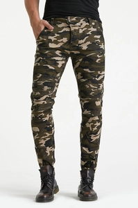 Detail of slim fit camo motorcycle jeans featuring accordion stretch panels at the knees