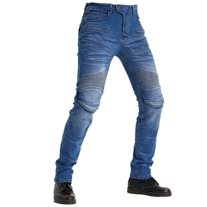 Detail of motorcycle jeans showing accordion stretch panels and knee protector padding