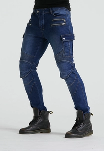 Detail of dark blue motorcycle jeans with pleated knees and decorative zippers