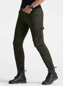 Detail of dark olive motorcycle pants showing accordion pleats on knees and slim fit cut