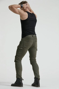 Rear view of slim fit olive green motorcycle jeans with flexible pleated stretch panels