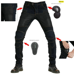 Detail of motorcycle jeans with detachable CE knee and hip protectors in blue denim