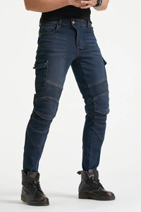 Detail of motorcycle denim pants with articulated knee pleats and utility side pockets