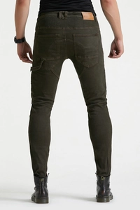 Rear view of slim fit motorcycle jeans in dark olive green with accordion stretch panels