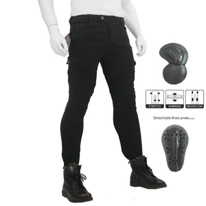 Detail view of black motorcycle jeans showing stretch fabric and knee protection system