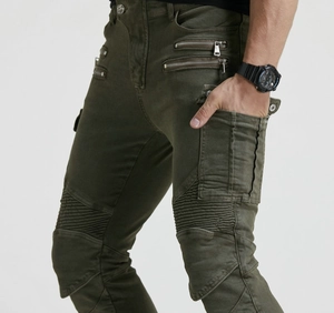 Detail of military green motorcycle pants featuring tactical pockets and knee pleats