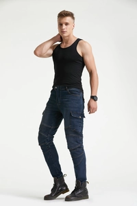Detail of blue motorcycle jeans with ribbed knee stretch panels and side cargo pockets