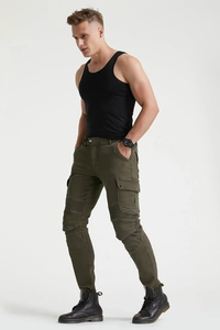 Detail view of motorcycle riding jeans featuring ribbed pleats on the knee and cargo pockets