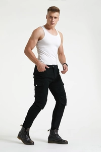 Detail of black motorcycle riding jeans featuring cargo pockets and pleated knee panels