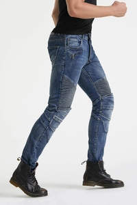 Detail view of motorcycle jeans featuring ribbed stretch panels and washed denim texture
