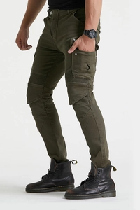 Army green motorcycle jeans detail featuring protective knee pleats and cargo pockets
