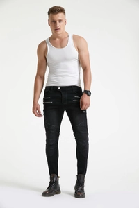 Detail of slim-fit motorcycle jeans with knee pleats and zip accents on black denim