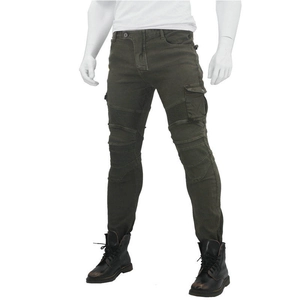 Detail of army green motorcycle pants with knee moto pleating and cargo side pockets
