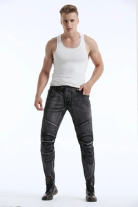 Detail of biker-style pleated knees on vintage wash grey motorcycle riding jeans