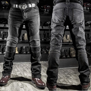 Protective motorcycle riding jeans with accordion stretch panels for knee and back comfort