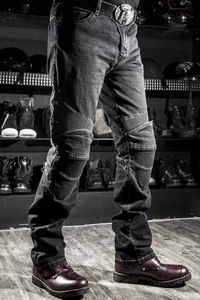Protective motorcycle riding jeans with knee stretch panels in a dark grey industrial style