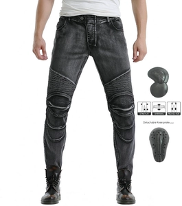 Detail of grey motorcycle riding jeans showing stretch shirring panels and knee protectors