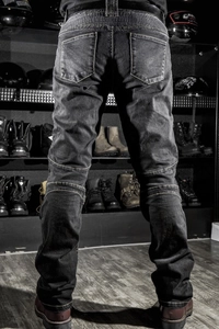 Protective motorcycle riding jeans in black with flexible accordion panels on back waist