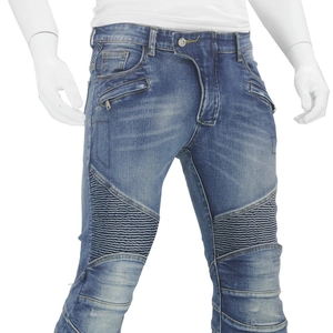 Close-up of pleated accordion panels on light blue washed vintage biker motorcycle jeans