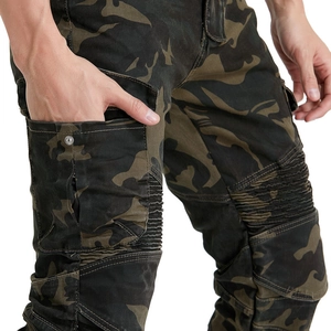 Detailed close-up of camouflage motorcycle jeans featuring protective knee pleats and side pockets