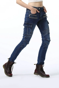 Detail of slim-fit denim motorcycle pants featuring ribbed knee pads and cargo pockets
