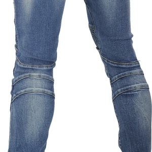 Detail of blue washed motorcycle jeans with pleated stitching on knees for biker style