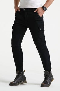 Detail of black slim-fit motorcycle jeans featuring protective knee texture and cargo pockets