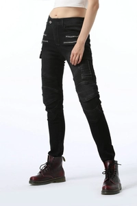 Detailed view of women's biker jeans featuring accordion pleats and decorative zippers
