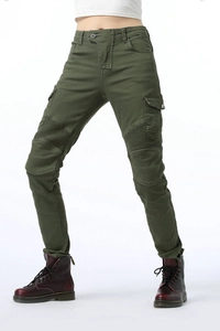 Detail of army green motorcycle pants featuring ribbed accordion panels on knees