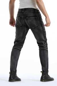 Rear view of men's dark gray motorcycle jeans featuring pleated knee and waist details