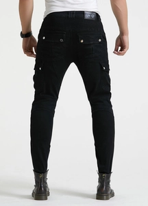 Rear view of black motorcycle jeans featuring cargo pockets and reinforced waist pleats