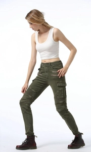Detail of army green moto cargo pants featuring waist zippers and knee pleated panels