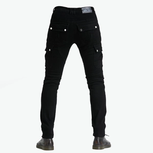Detail view of black motorcycle jeans featuring multi-pocket design and pleated back panels
