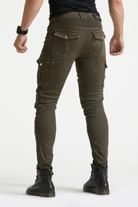 Detail view of motorcycle jeans featuring accordion stretch panels and tactical cargo pockets