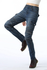 Close-up of flexible knee pleats and side cargo pockets on blue motorcycle jeans