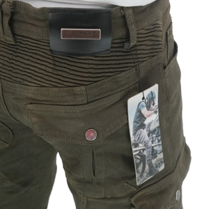 Detail of army green motorcycle trousers showing elastic waist pleats and side cargo pockets