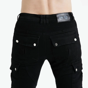 Detail of motorcycle jeans featuring elastic ribbed panels and cargo pockets on the back