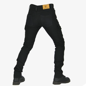 Macro detail of black motorcycle jeans back showing slim fit, leather label, and pockets