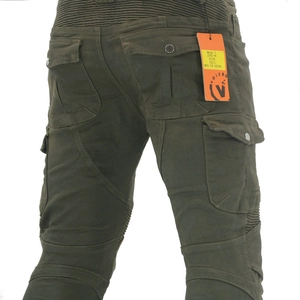Macro detail of elastic pleated waist and cargo pocket on motorcycle riding jeans