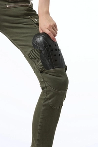 Detail of inserting a VULCANO protective knee pad into olive green motorcycle jeans