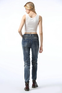Blue slim-fit biker jeans for women featuring accordion stretch panels on knees and back