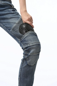 Women's motorcycle riding jeans in blue wash denim with protective knee pads
