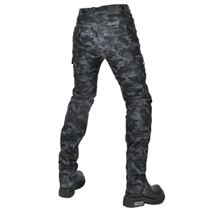 Detail of grey camouflage motorcycle pants with multi-pockets and pleated knee panels
