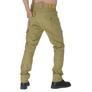 Detail view of khaki moto jeans with accordion stretch panels and leather waist patch