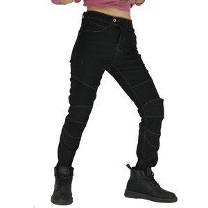 Detail of motorcycling jeans featuring ribbed knee panels and orange contrast stitching