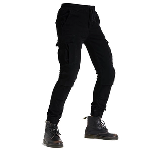 Detail of black motorcycle cargo pants with elastic drawstring waist and large side pockets