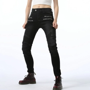 Women's slim black motorcycle jeans with pleated knees and decorative metal zippers