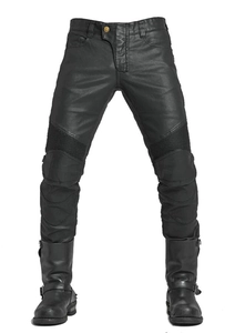 Detail of waterproof black motorcycle trousers with flexible knee armor and elastic panels